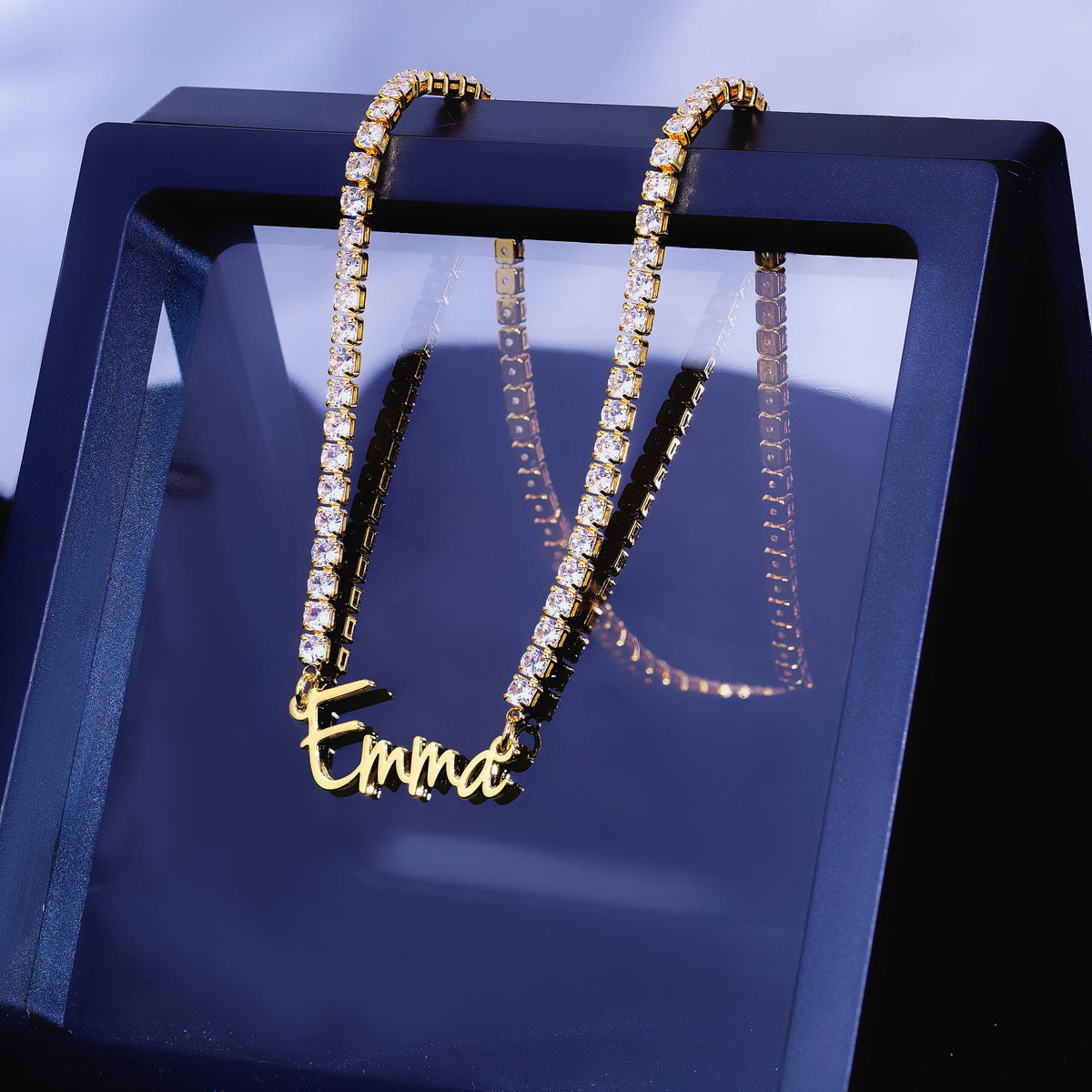 0002_0000_CADENA-EMMACADENAICECONDIAMANTE-CAJANEGRAEDITADA_jpg