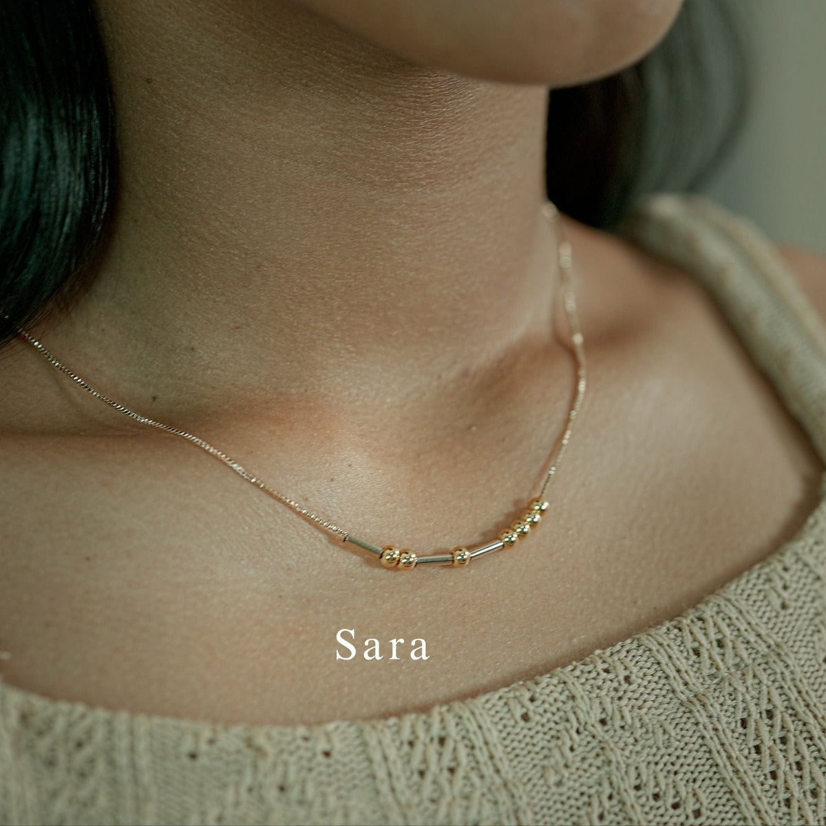 morse code necklace - neck shot